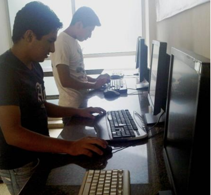 Moro Moro scholars at work in a lab on campus